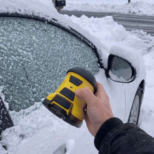 Frostio cordless electric ice scraper clearing a frosted windshield